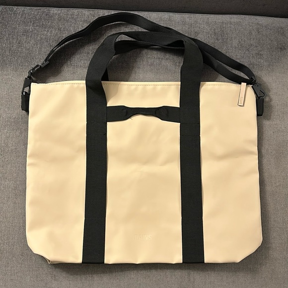 Rains tote bag in the color sand. - Picture 1 of 5